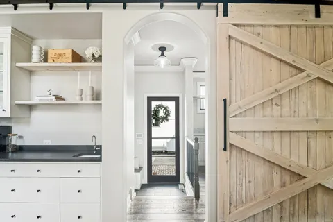 a kitchen with a stove and a sink