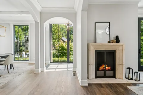 a view of a livingroom with furniture window and wooden floor