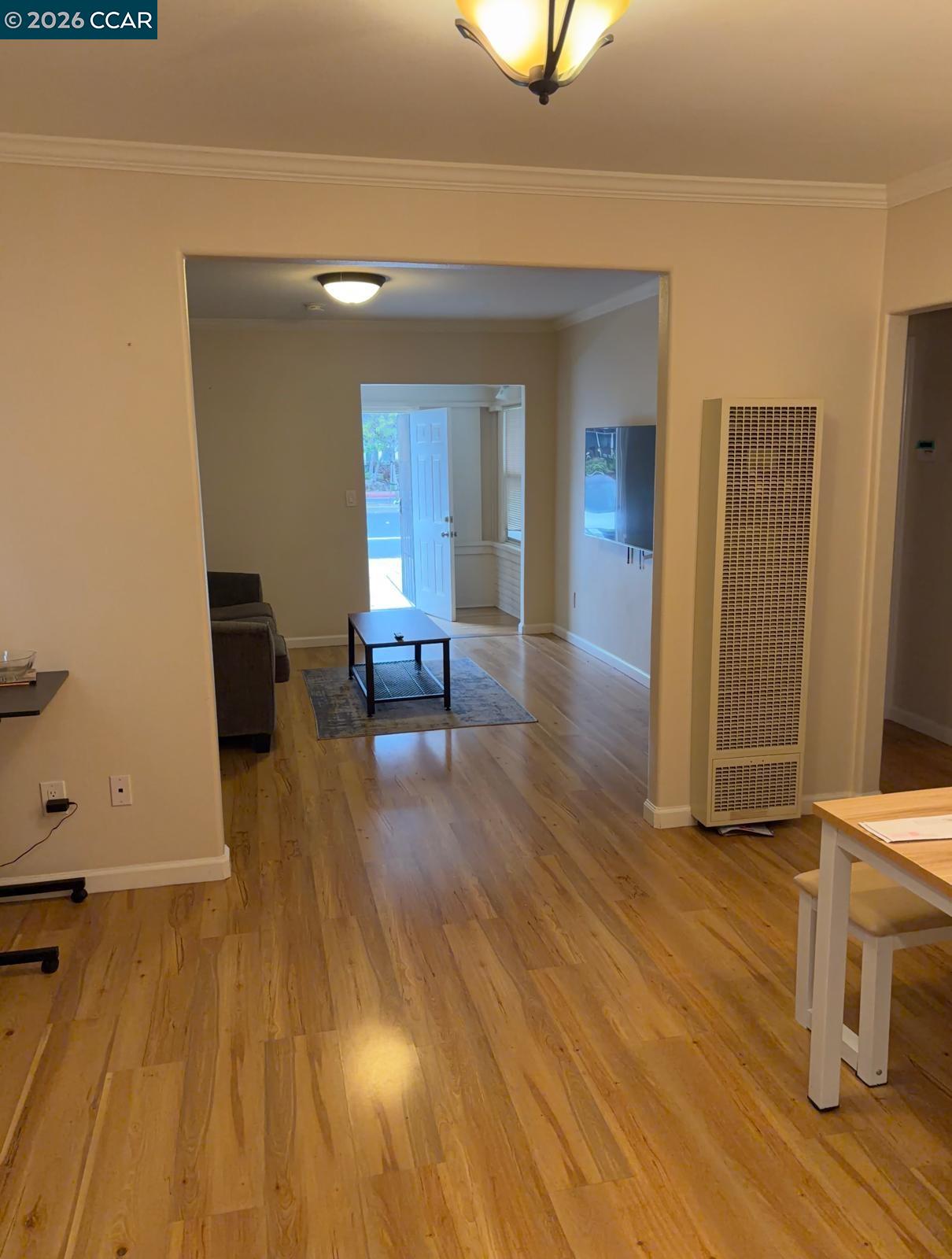 558 A Street Hayward, CA 94541 - Photo 2 of 9 a view of a living room with wooden floor