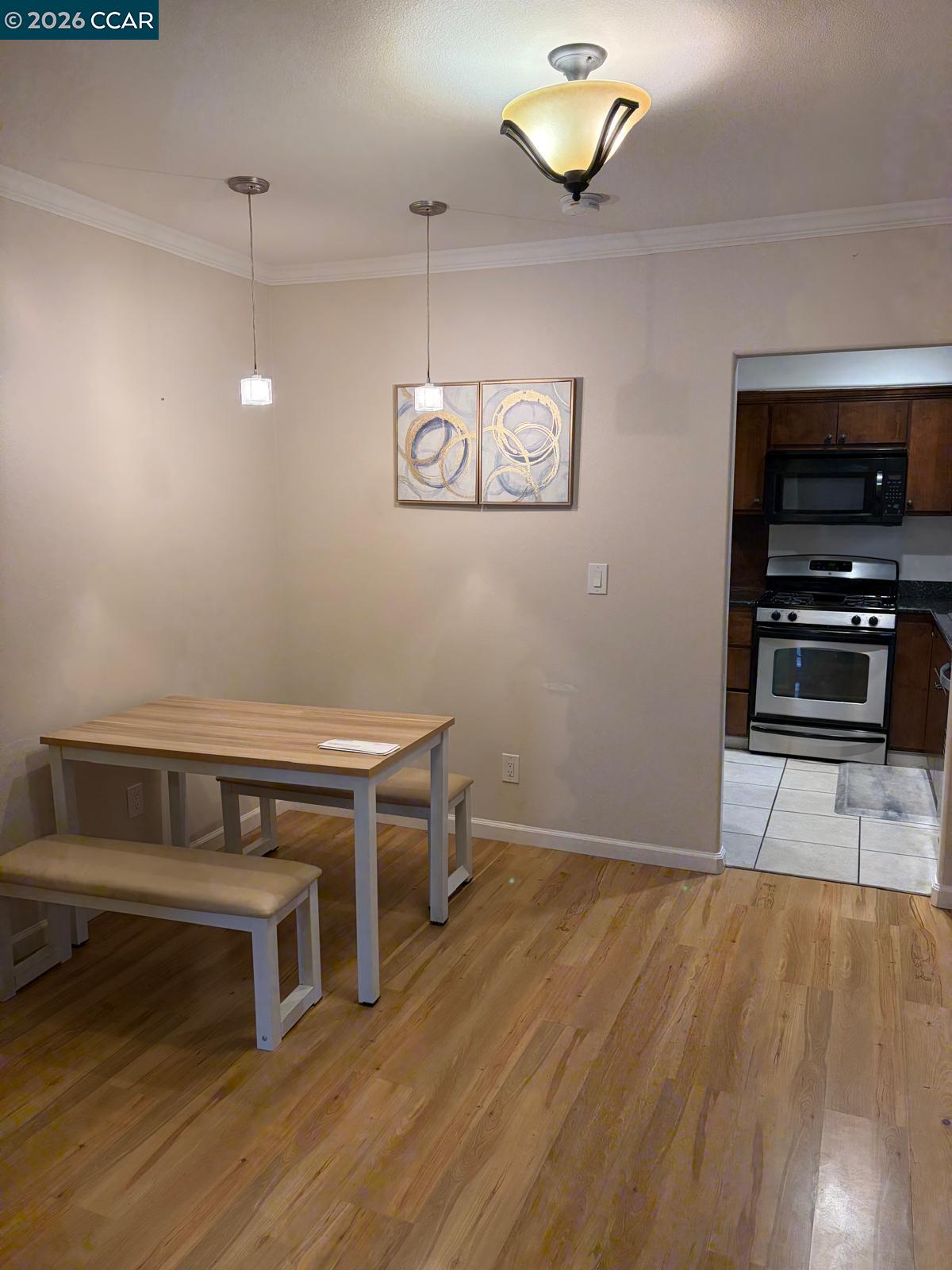 558 A Street Hayward, CA 94541 - Photo 6 of 9 a view of a livingroom with furniture and a flat screen tv