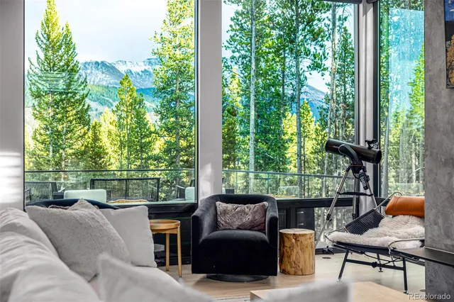 a backyard of a house with outdoor seating