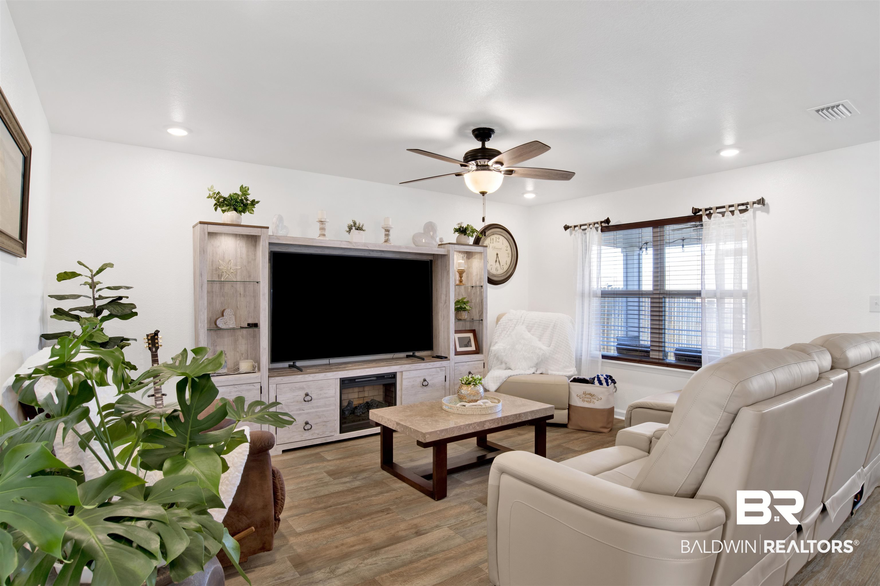 8102 Irwin Loop Daphne, AL 36526 - Photo 4 of 30 Living room with hardwood / wood-style floors and ceiling fan