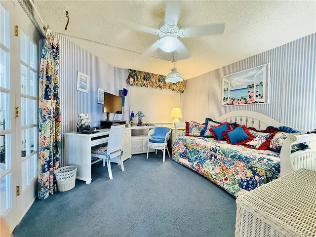 a kitchen with a sink and stove
