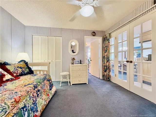 a balcony with view of an ocean