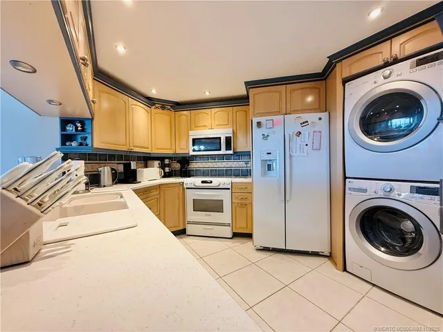 a living room with furniture rug and window