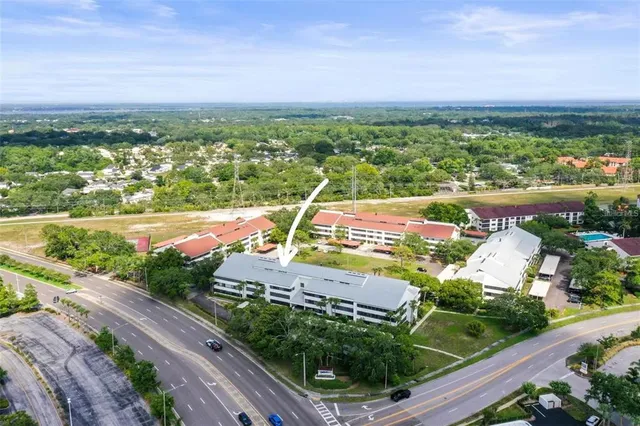 an aerial view of a house with a garden