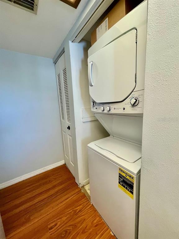 2579 Countryside Boulevard, Unit 203 Clearwater, FL 33761 - Photo 30 of 37 a utility room with a washer and dryer