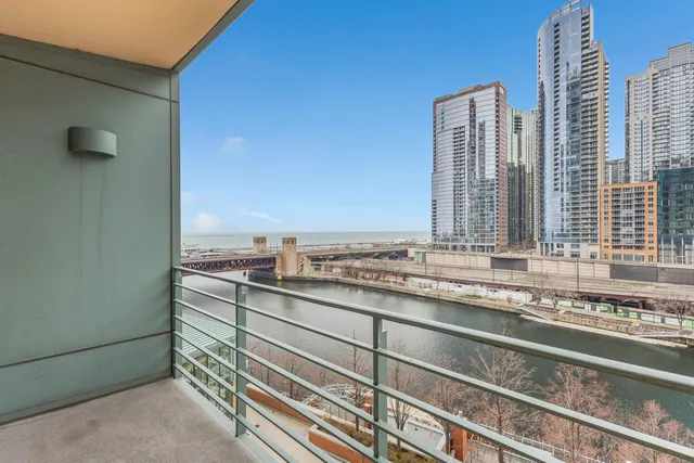 a view of a kitchen with a sink and cabinets