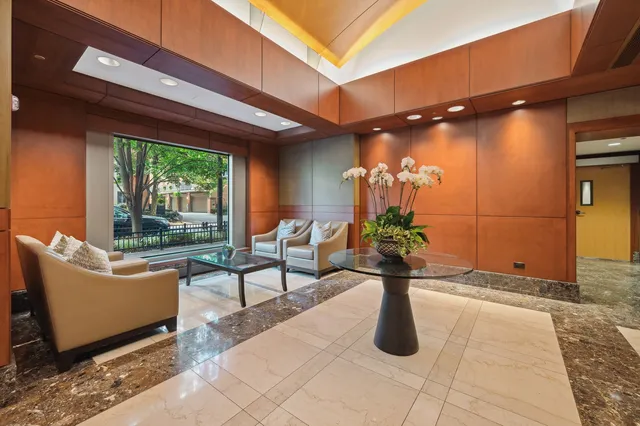 a view of a chairs and table in a patio