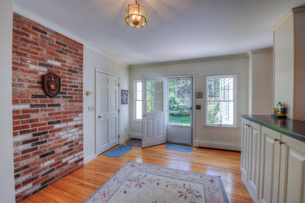 923 Old Post Road Cotuit, MA 02635 - Photo 4 of 35 a view of an empty room and window