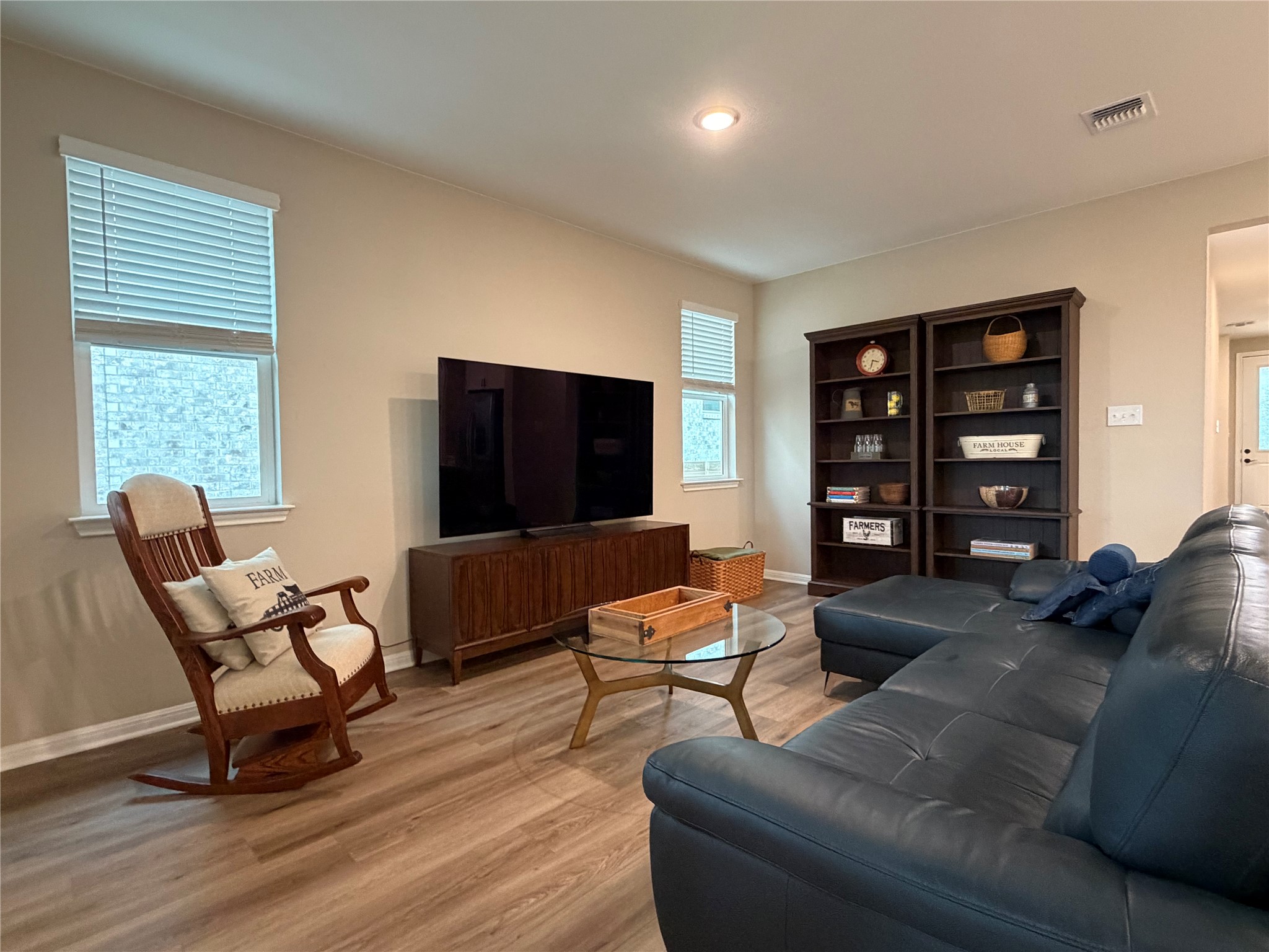 549 Raleigh Drive Georgetown, TX 78633 - Photo 14 of 29 a living room with furniture and a flat screen tv