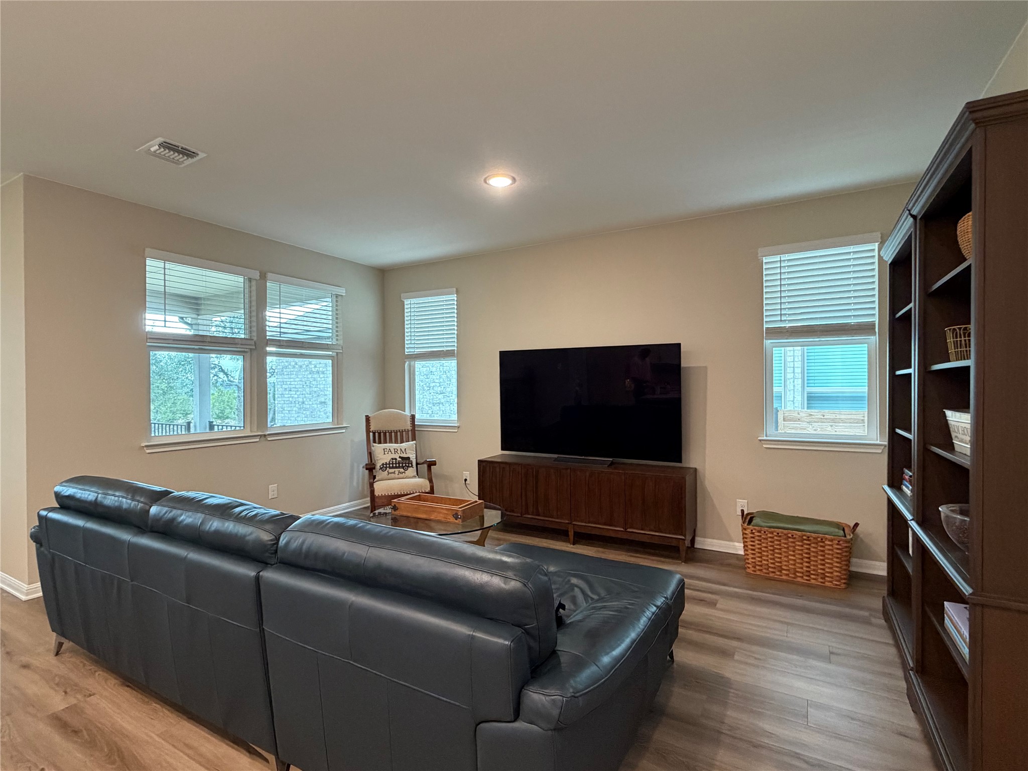 549 Raleigh Drive Georgetown, TX 78633 - Photo 15 of 29 a living room with furniture and a flat screen tv