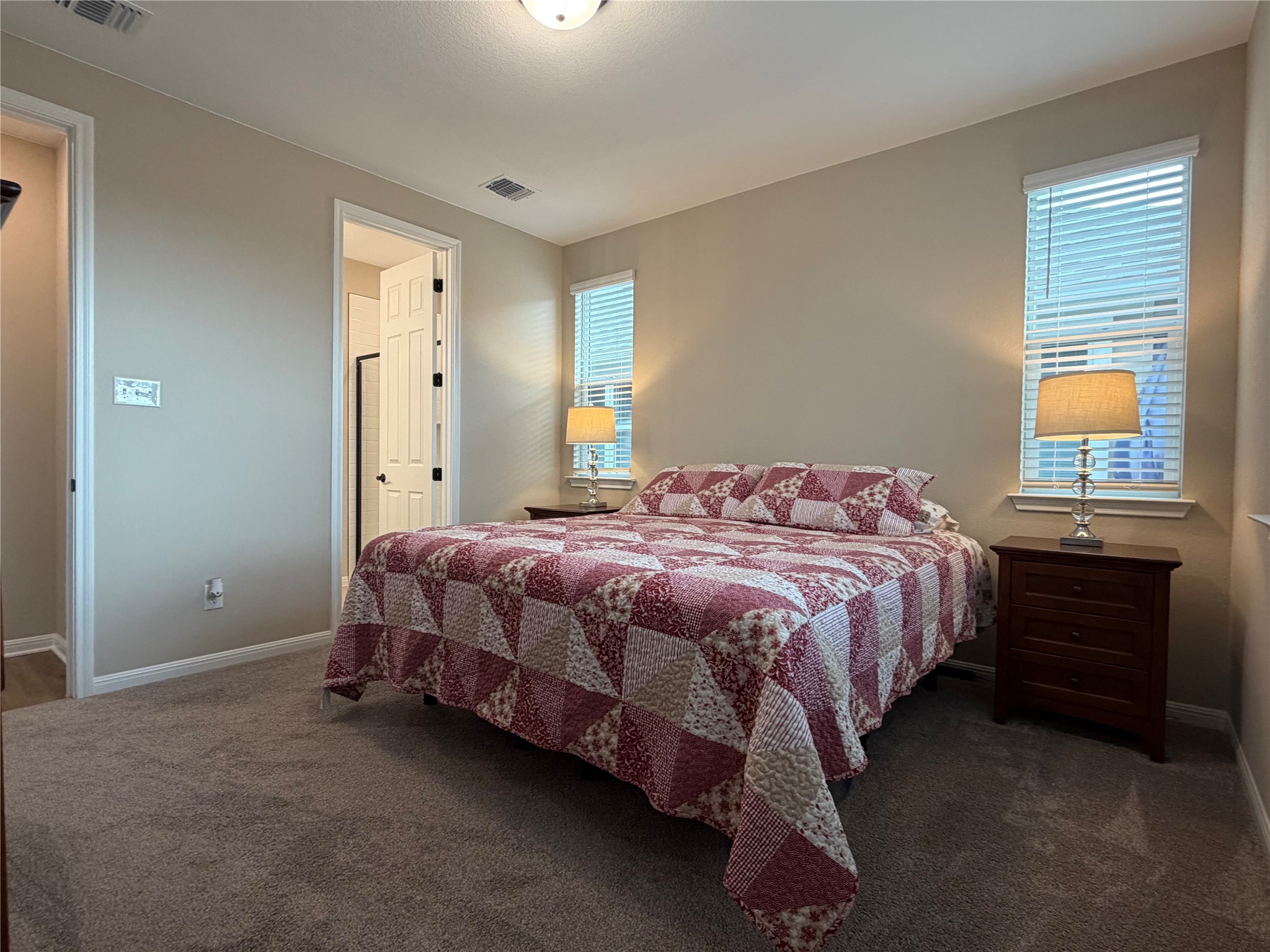 549 Raleigh Drive Georgetown, TX 78633 - Photo 18 of 29 a spacious bedroom with a bed and a window