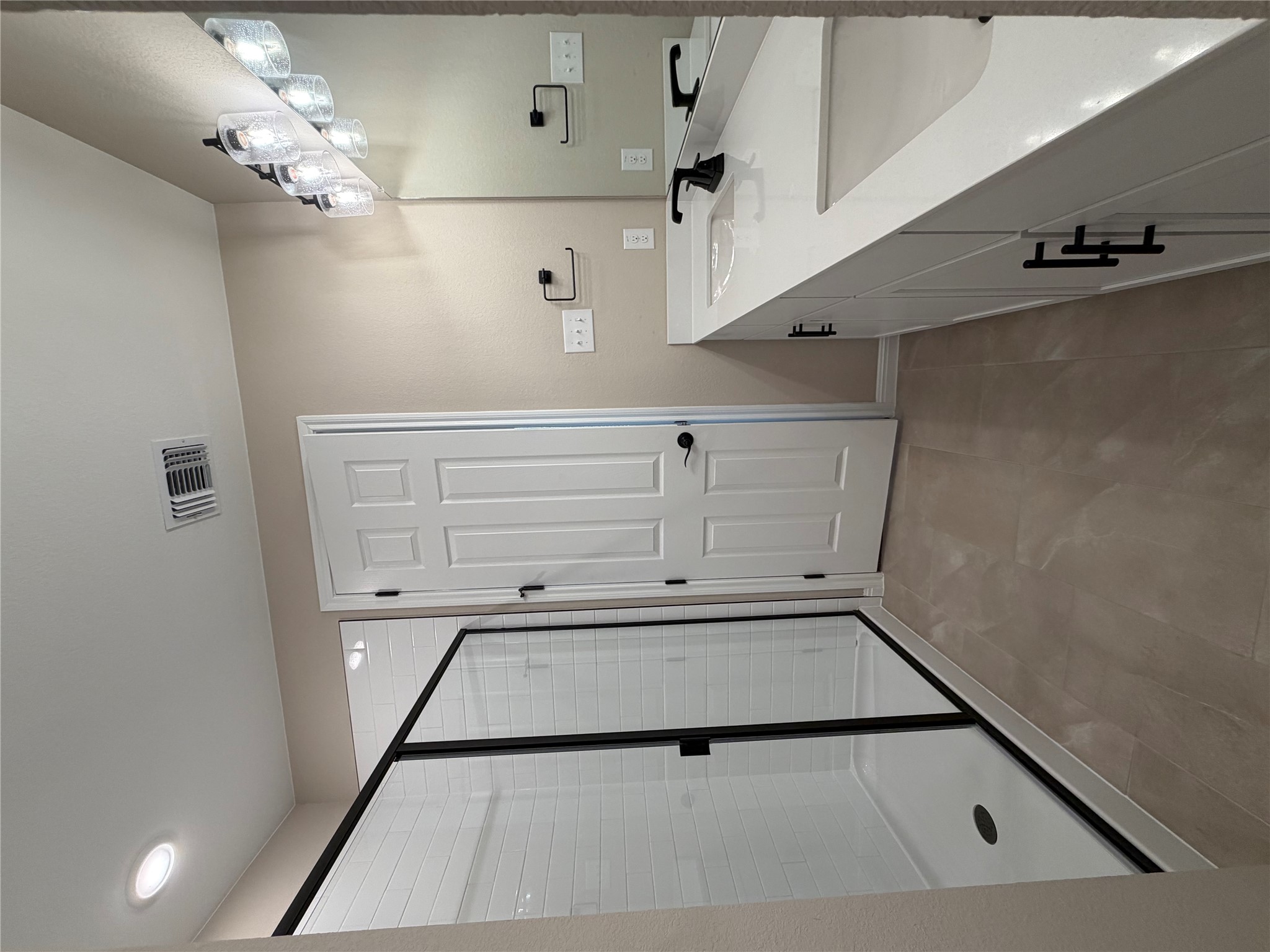 549 Raleigh Drive Georgetown, TX 78633 - Photo 21 of 29 a bathroom with a double vanity sink mirror and shower