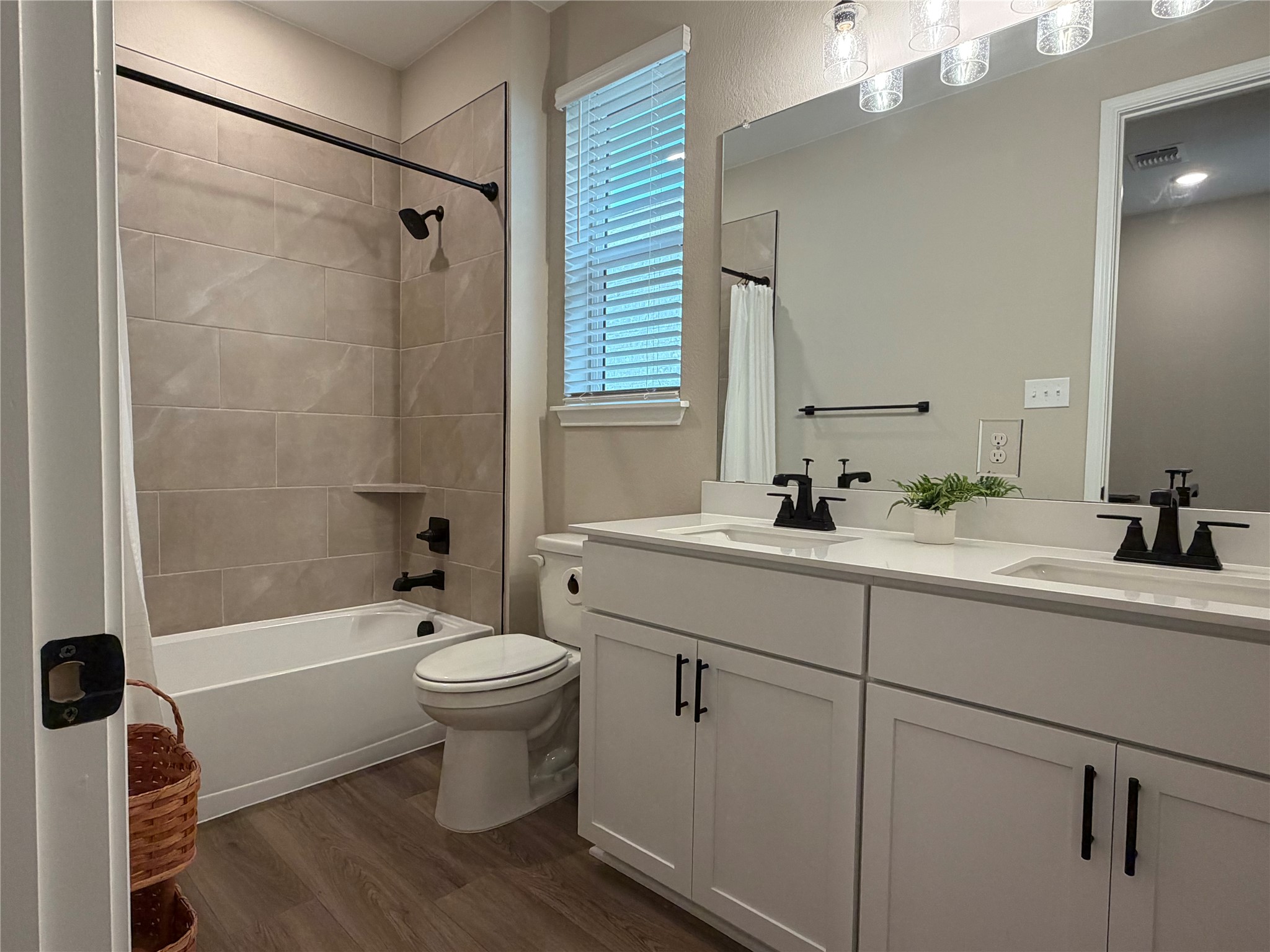 549 Raleigh Drive Georgetown, TX 78633 - Photo 8 of 29 a bathroom with a sink a toilet and shower