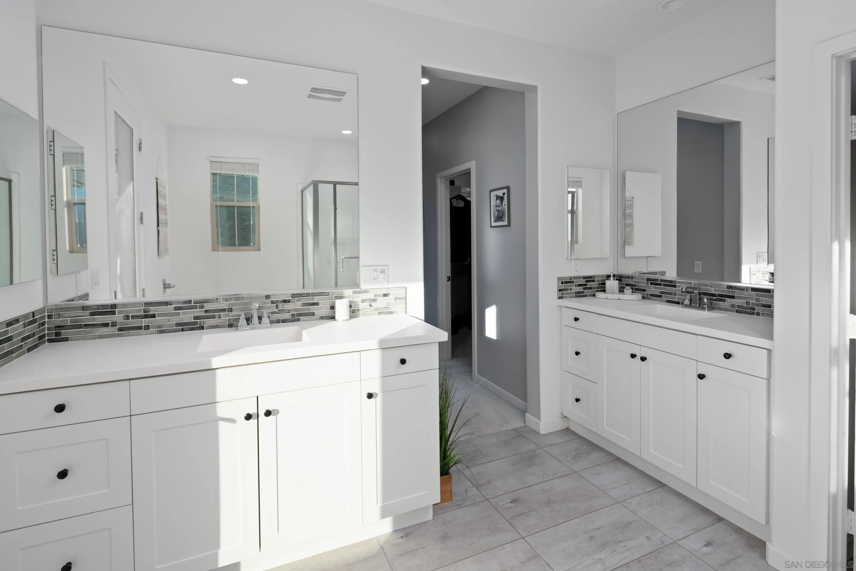 8932 Hightail Drive Santee, CA 92071 - Photo 13 of 20 a bathroom with a sink and a mirror