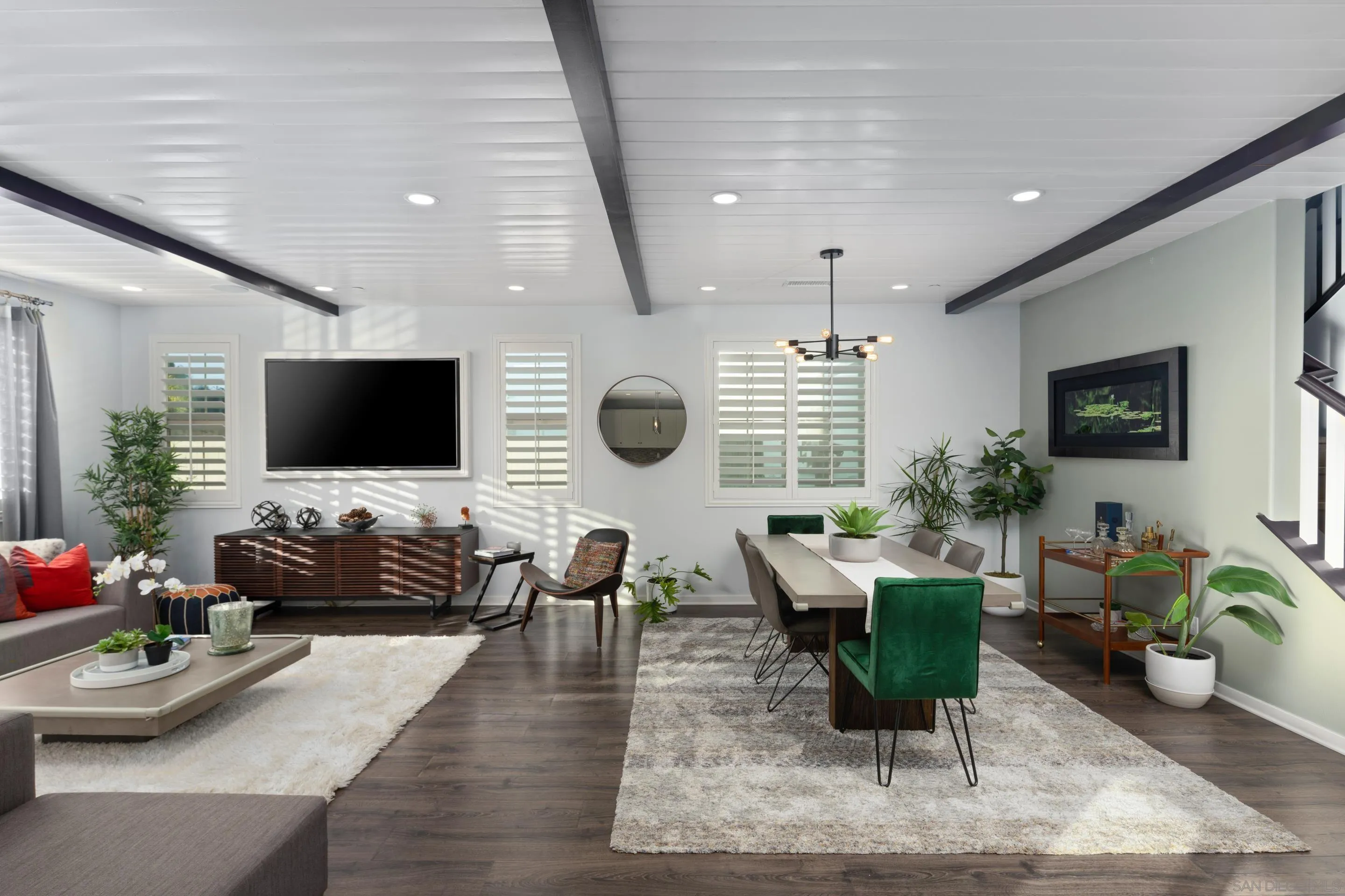 8932 Hightail Drive Santee, CA 92071 - Photo 6 of 20 a living room with furniture and a flat screen tv