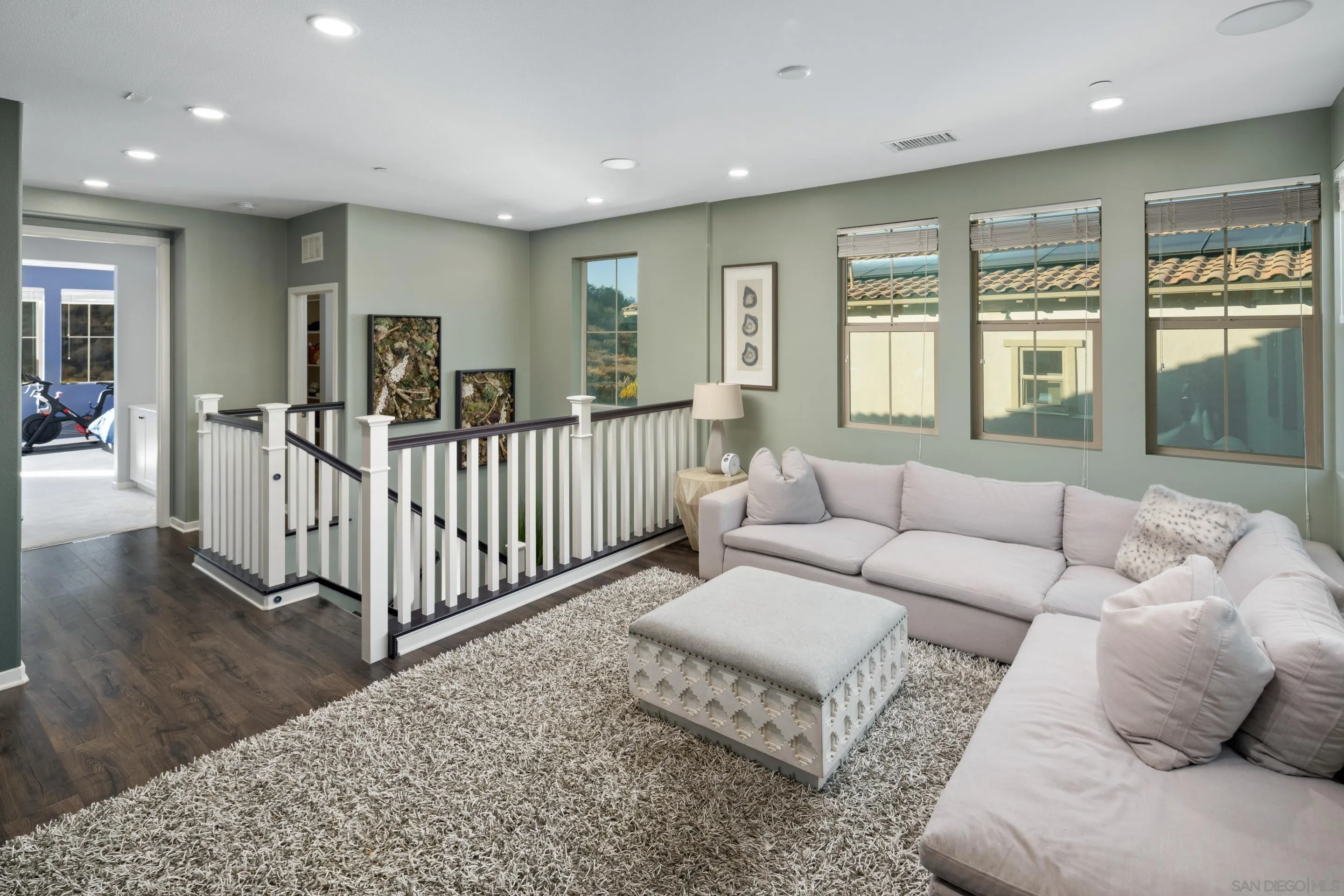 8932 Hightail Drive Santee, CA 92071 - Photo 9 of 20 a living room with furniture and windows