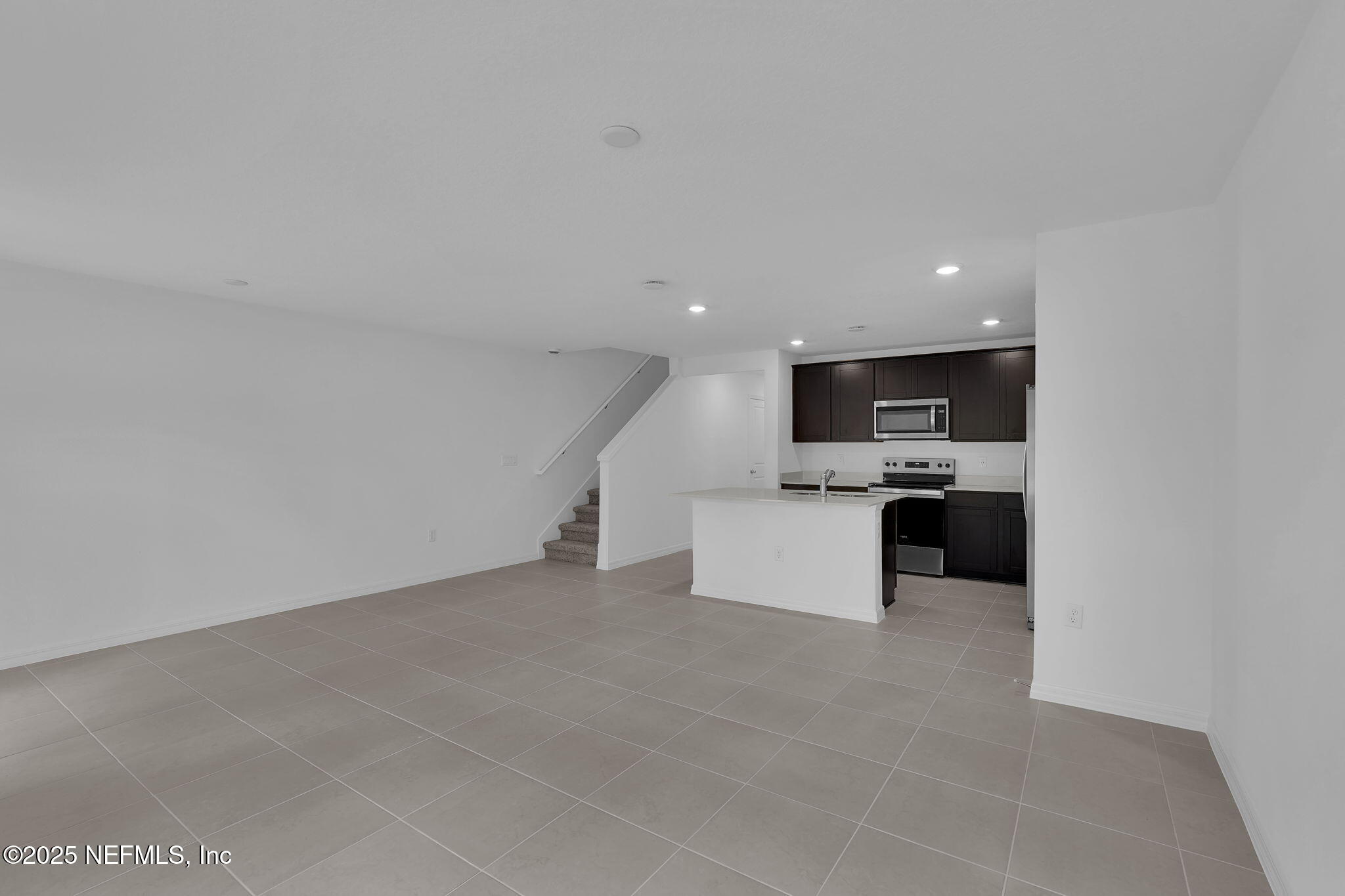 1916 Normandy Pines Lane Jacksonville, FL 32221 - Photo 12 of 21 a view of kitchen with kitchen island white cabinets and appliances