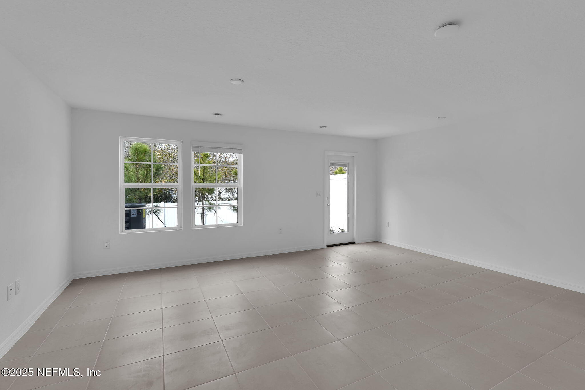 1916 Normandy Pines Lane Jacksonville, FL 32221 - Photo 14 of 21 an empty room with windows