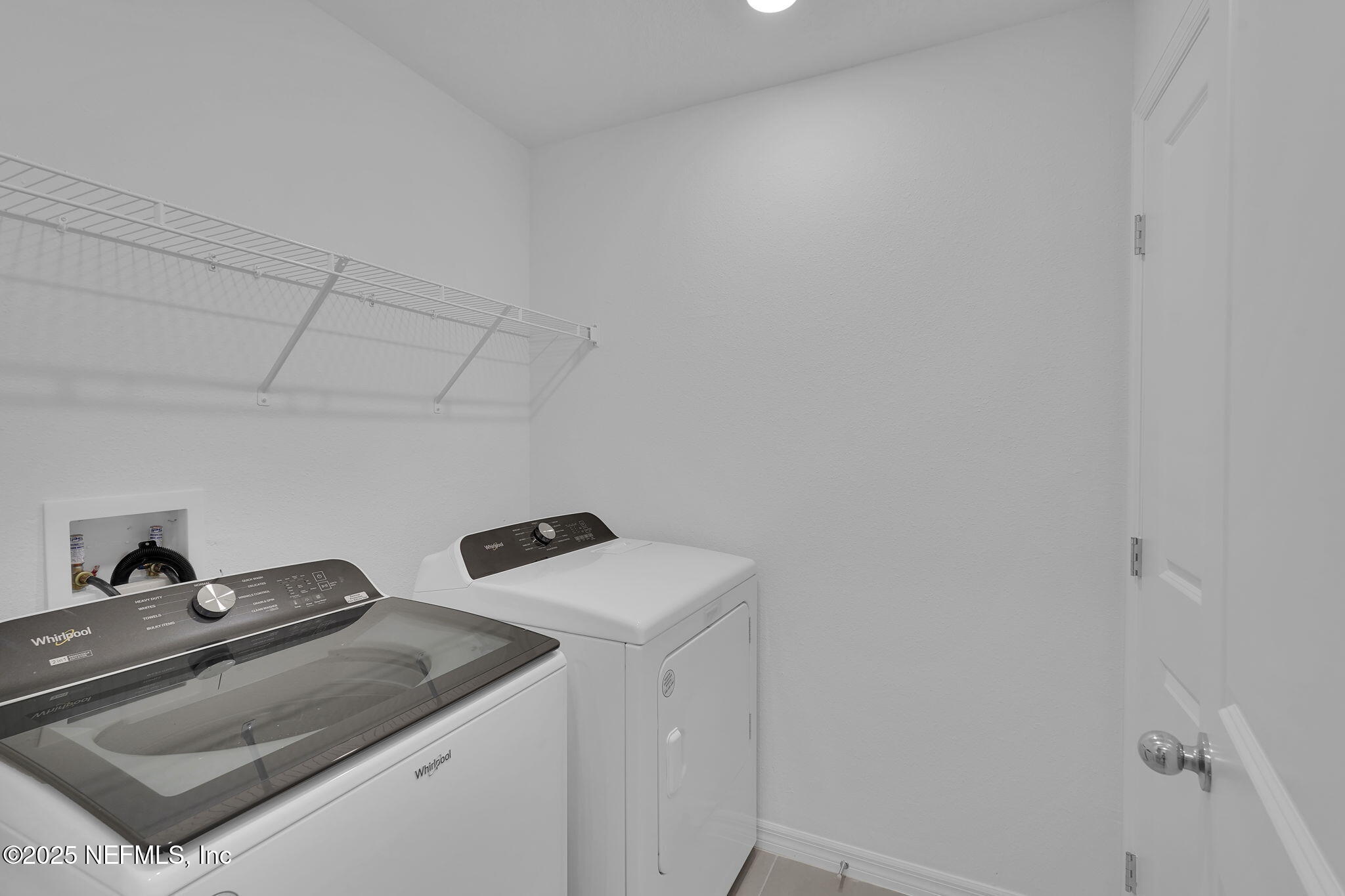 1916 Normandy Pines Lane Jacksonville, FL 32221 - Photo 20 of 21 a utility room with dryer and washer