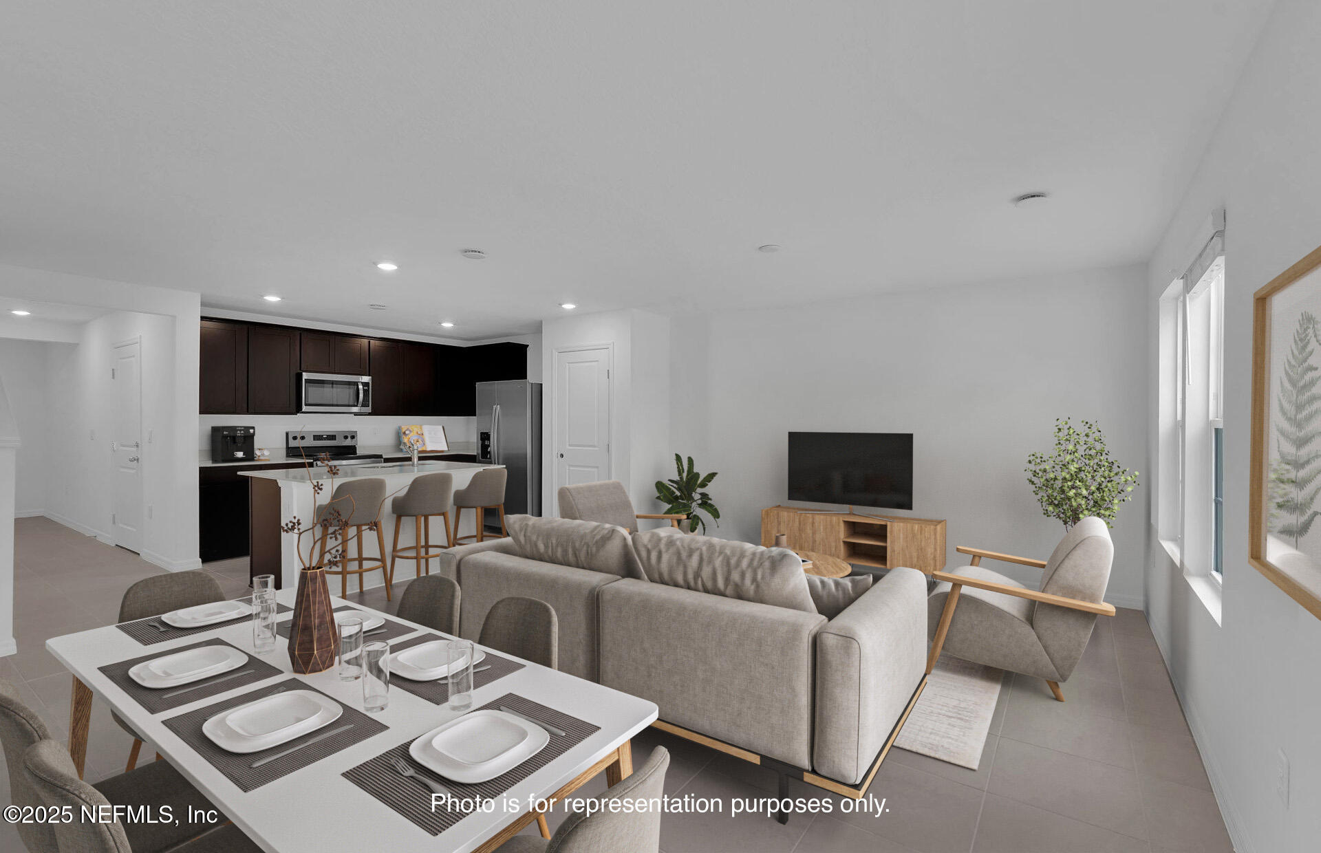1916 Normandy Pines Lane Jacksonville, FL 32221 - Photo 10 of 21 a living room with furniture and a view of kitchen