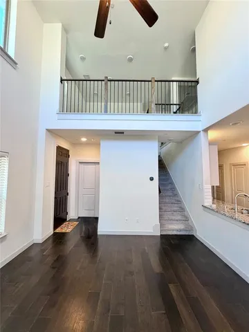 an entryway with wooden floor