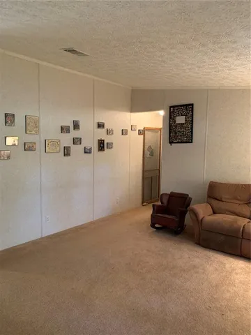 a view of livingroom with furniture