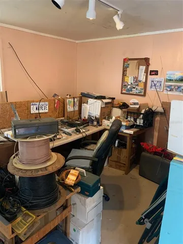 a view of a city street with a yard