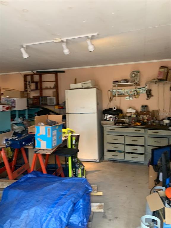 3544 East Withlacoochee Trail Dunnellon, FL 34434 - Photo 51 of 53 a storage room with washer and dryer