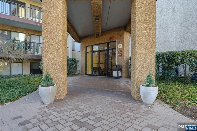 a view of a street with seating space