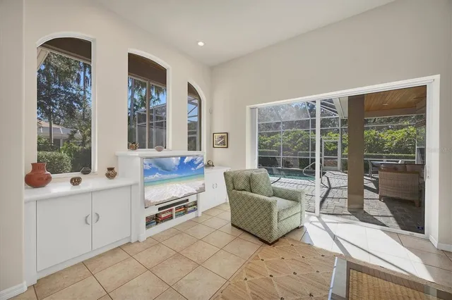 a view of a backyard with sitting area