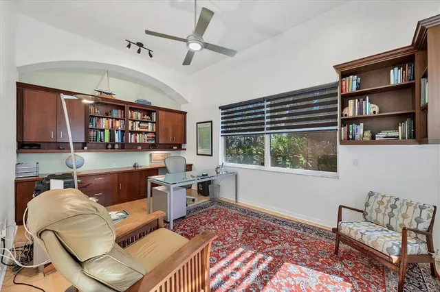 a view of a house with swimming pool and porch with furniture