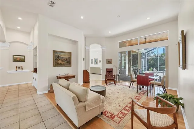 a living room with furniture and view of living room