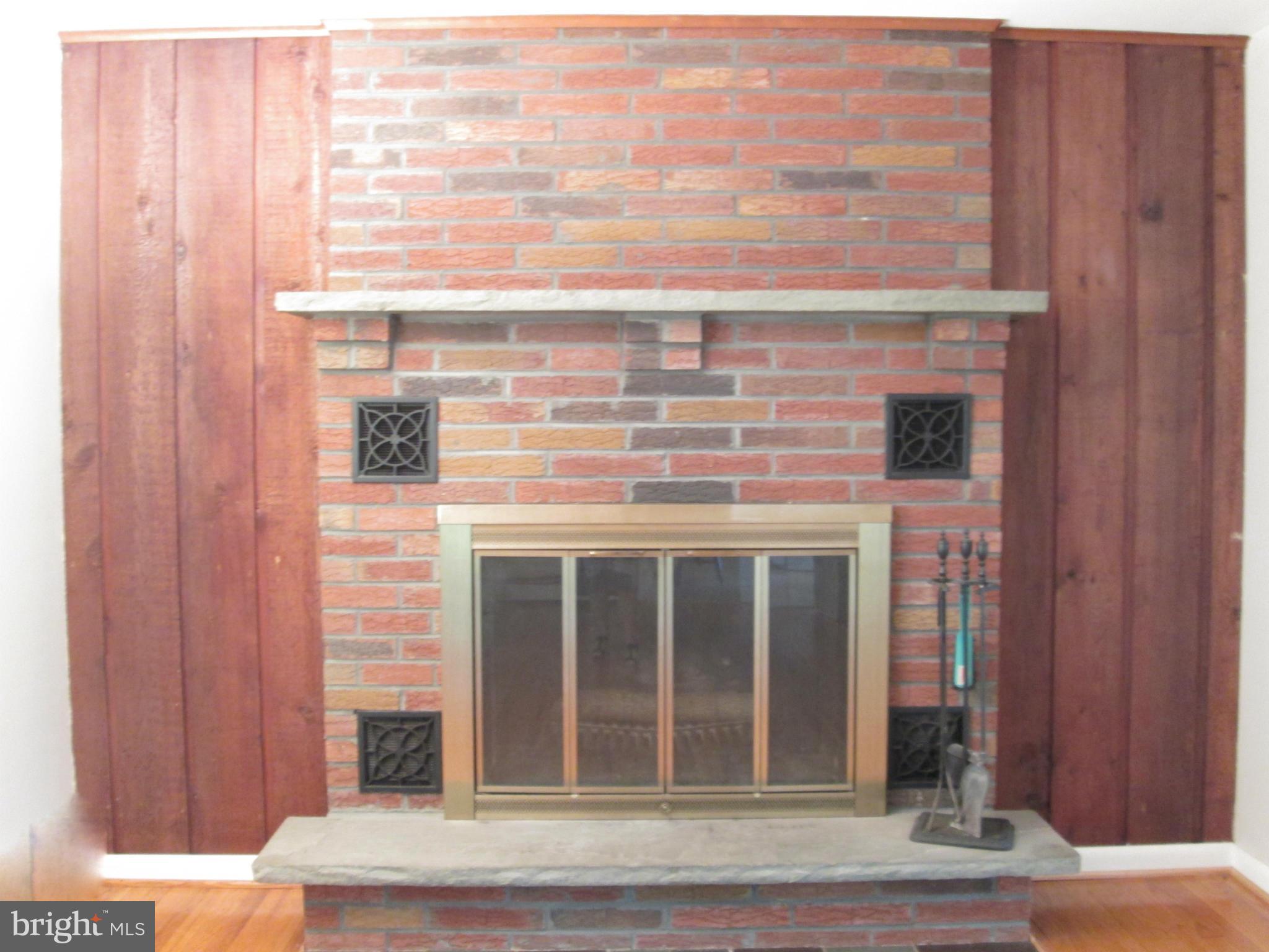 406 Old Joppa Road Fallston, MD 21047 - Photo 13 of 22 Wood burning fireplace in family room