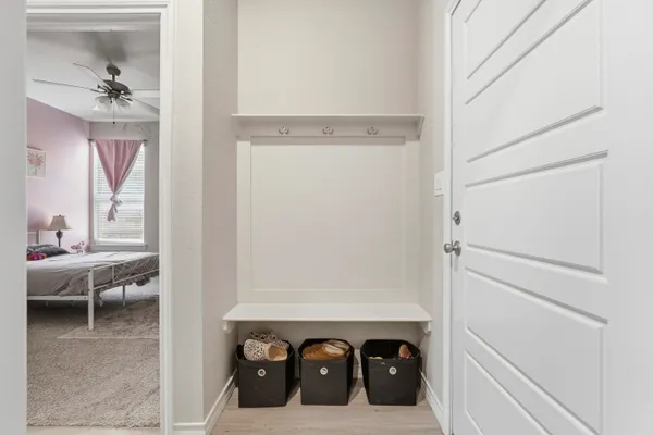 a view of a livingroom with furniture and front door