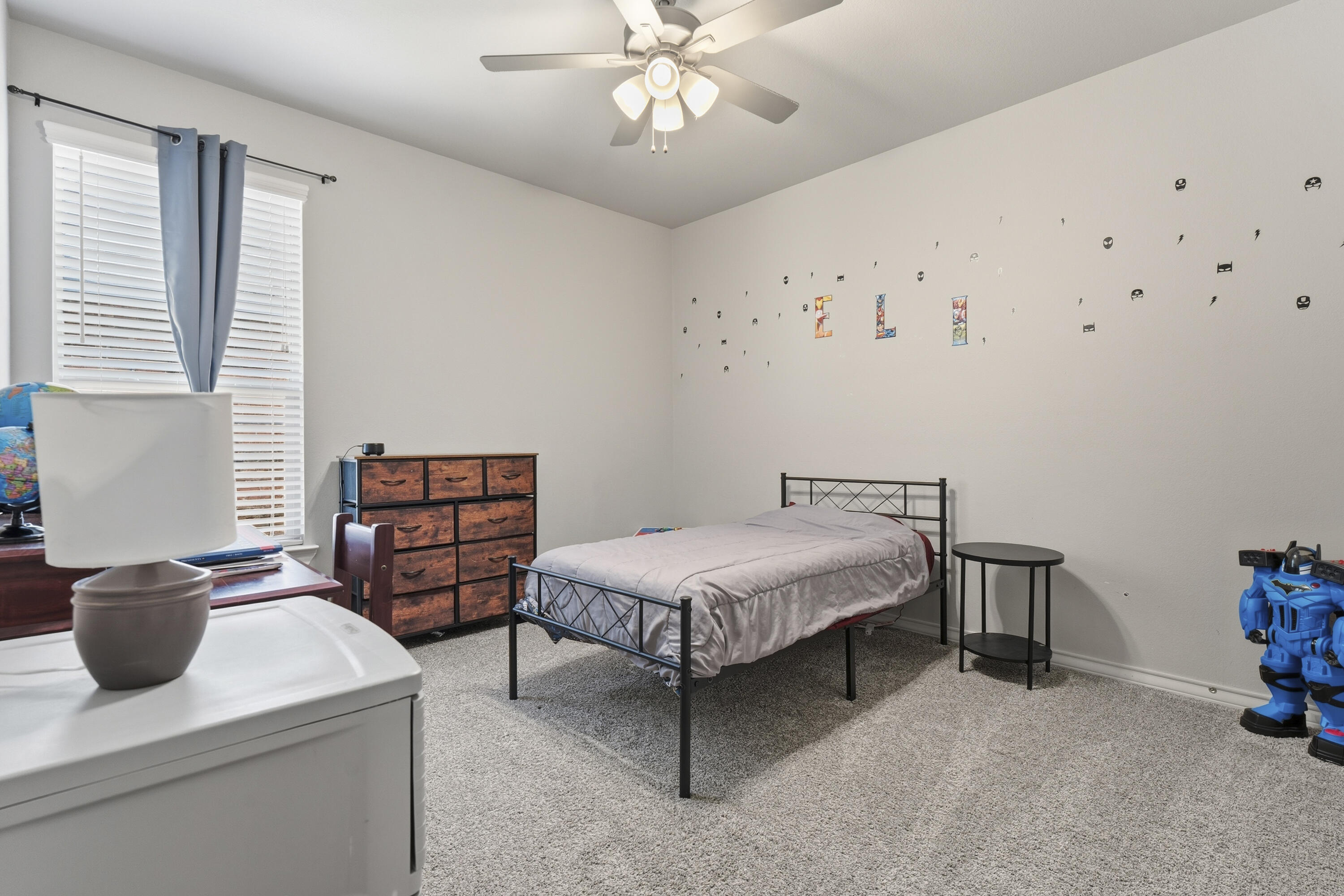 819 North 3rd Street Wolfforth, TX 79382 - Photo 23 of 31 a bedroom with furniture and window
