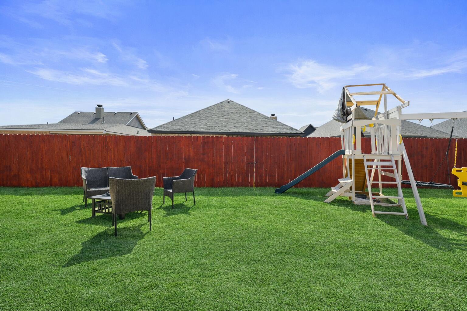 819 North 3rd Street Wolfforth, TX 79382 - Photo 25 of 31 a view of a house with a yard and sitting area
