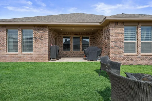 a view of a house with garden