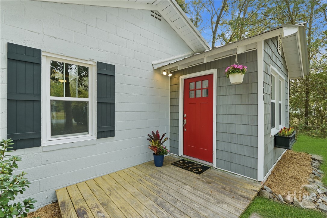 704 Lexington Avenue Rincon, GA 31326 - Photo 4 of 33 Grass has been enhanced.