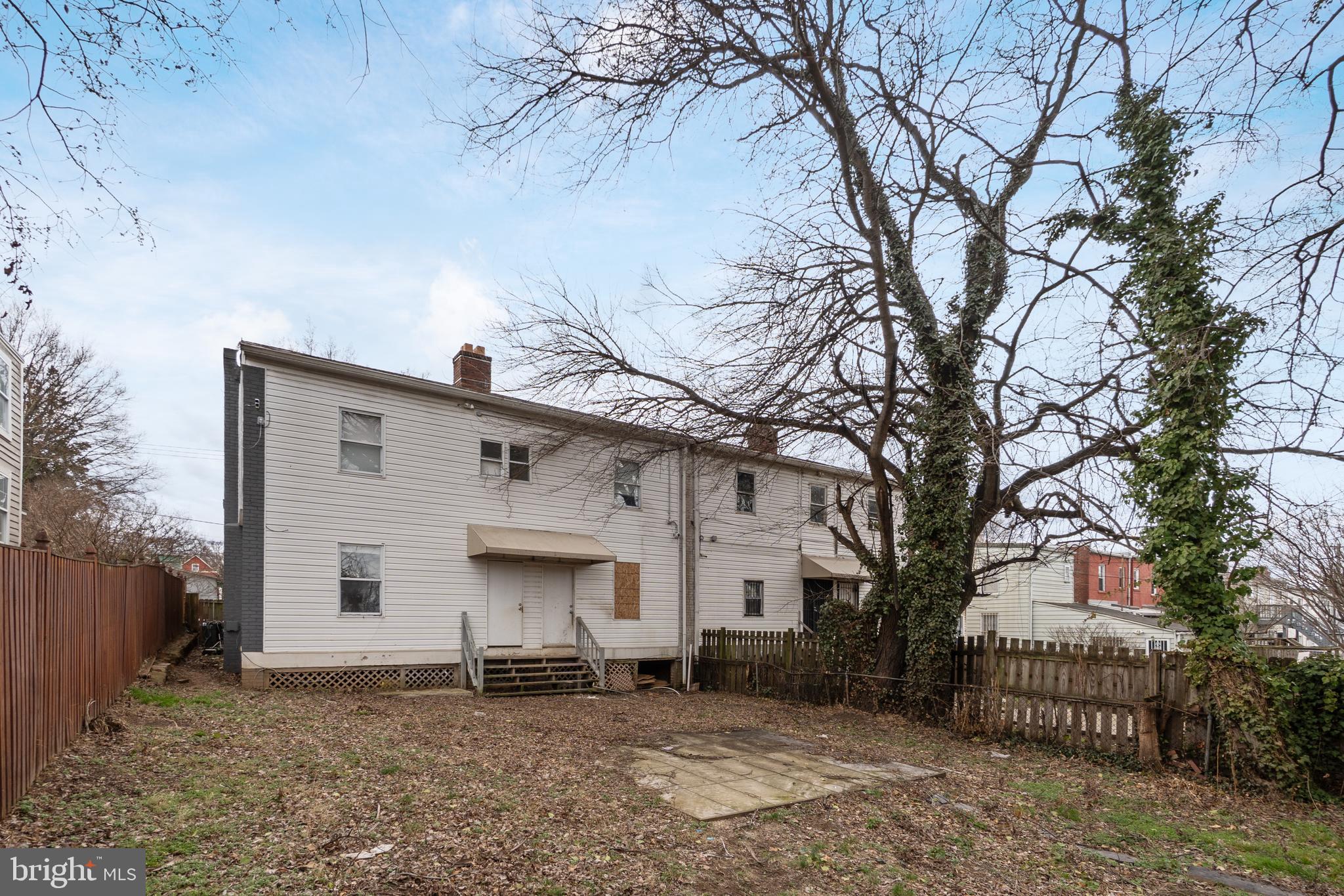 1526 V Street Southeast, Unit 2 Washington, DC 20020 - Photo 20 of 24 a front view of a house with a yard