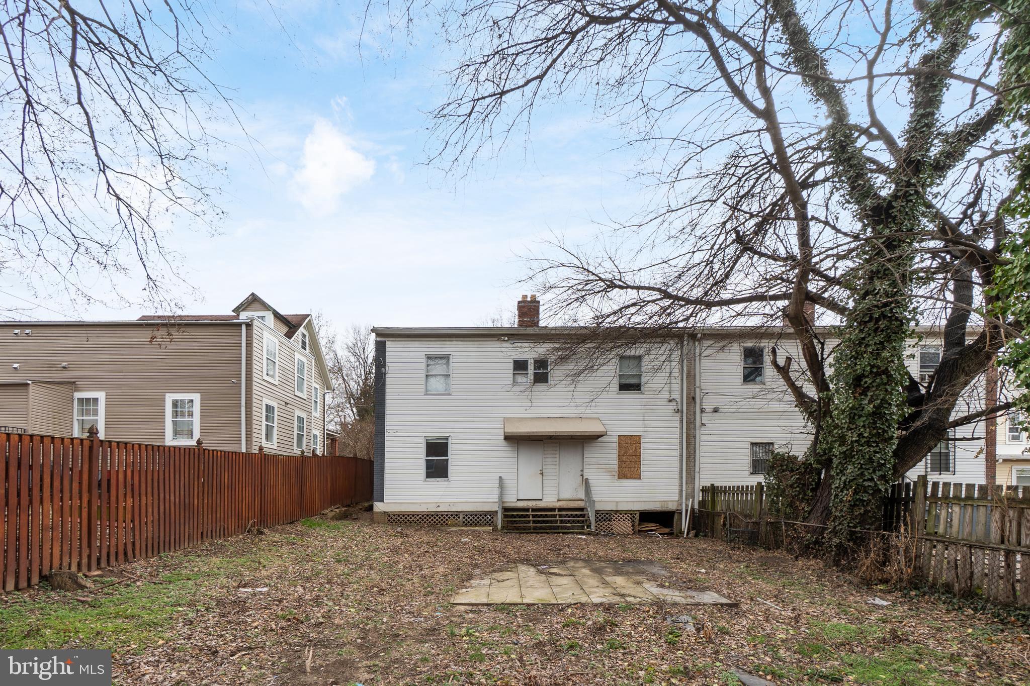 1526 V Street Southeast, Unit 2 Washington, DC 20020 - Photo 21 of 24 a front view of a house with a yard