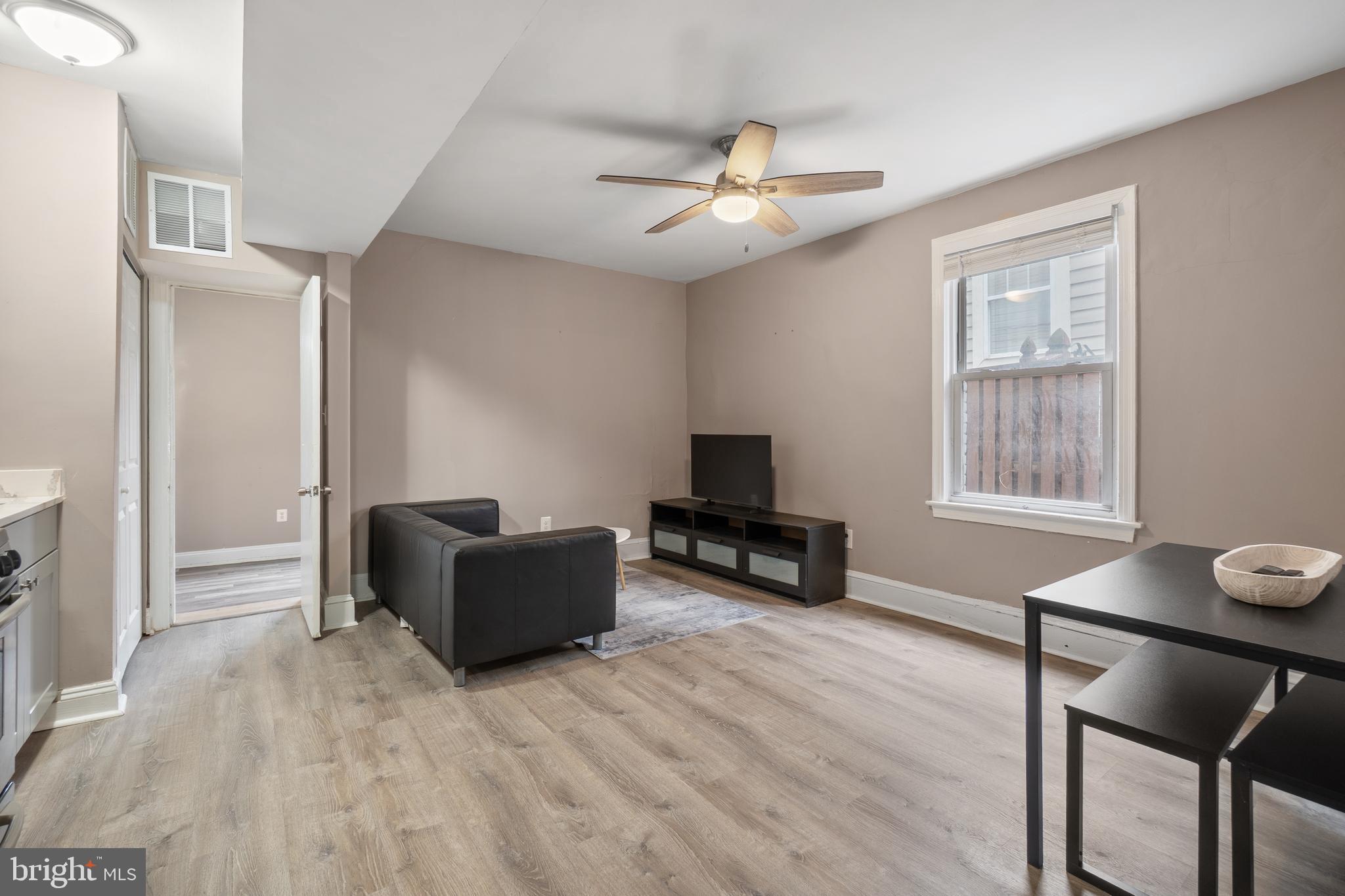 1526 V Street Southeast, Unit 2 Washington, DC 20020 - Photo 2 of 24 a living room with furniture