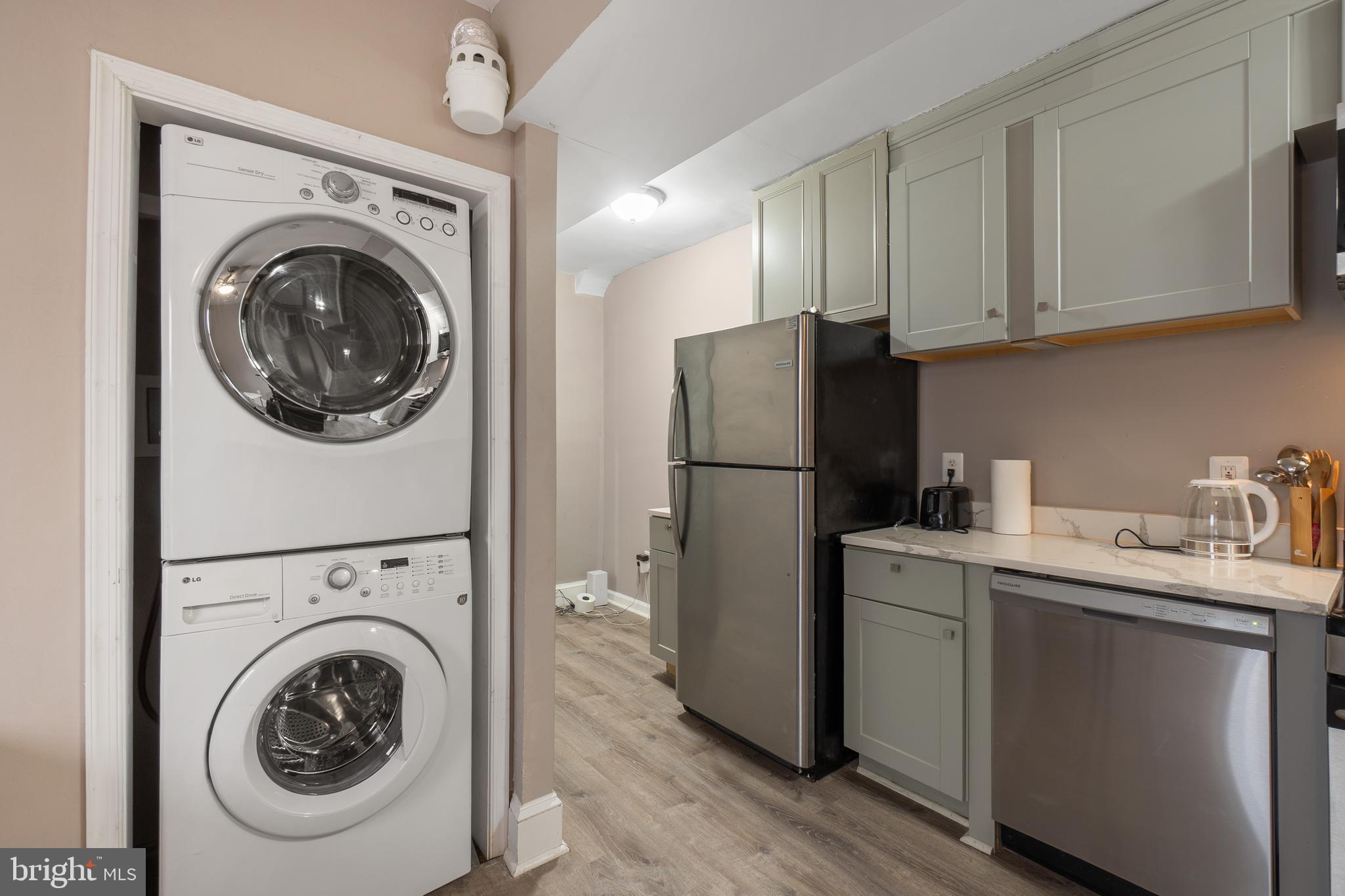 1526 V Street Southeast, Unit 2 Washington, DC 20020 - Photo 7 of 24 a utility room with sink dryer and washer