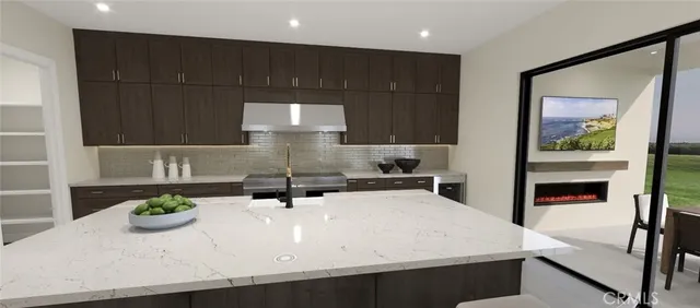 a kitchen with a sink a microwave and cabinets