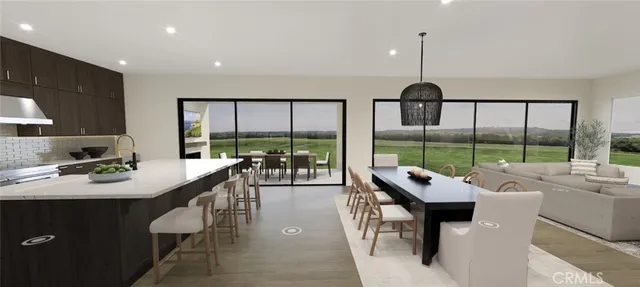 a very nice looking living room with a large window and furniture