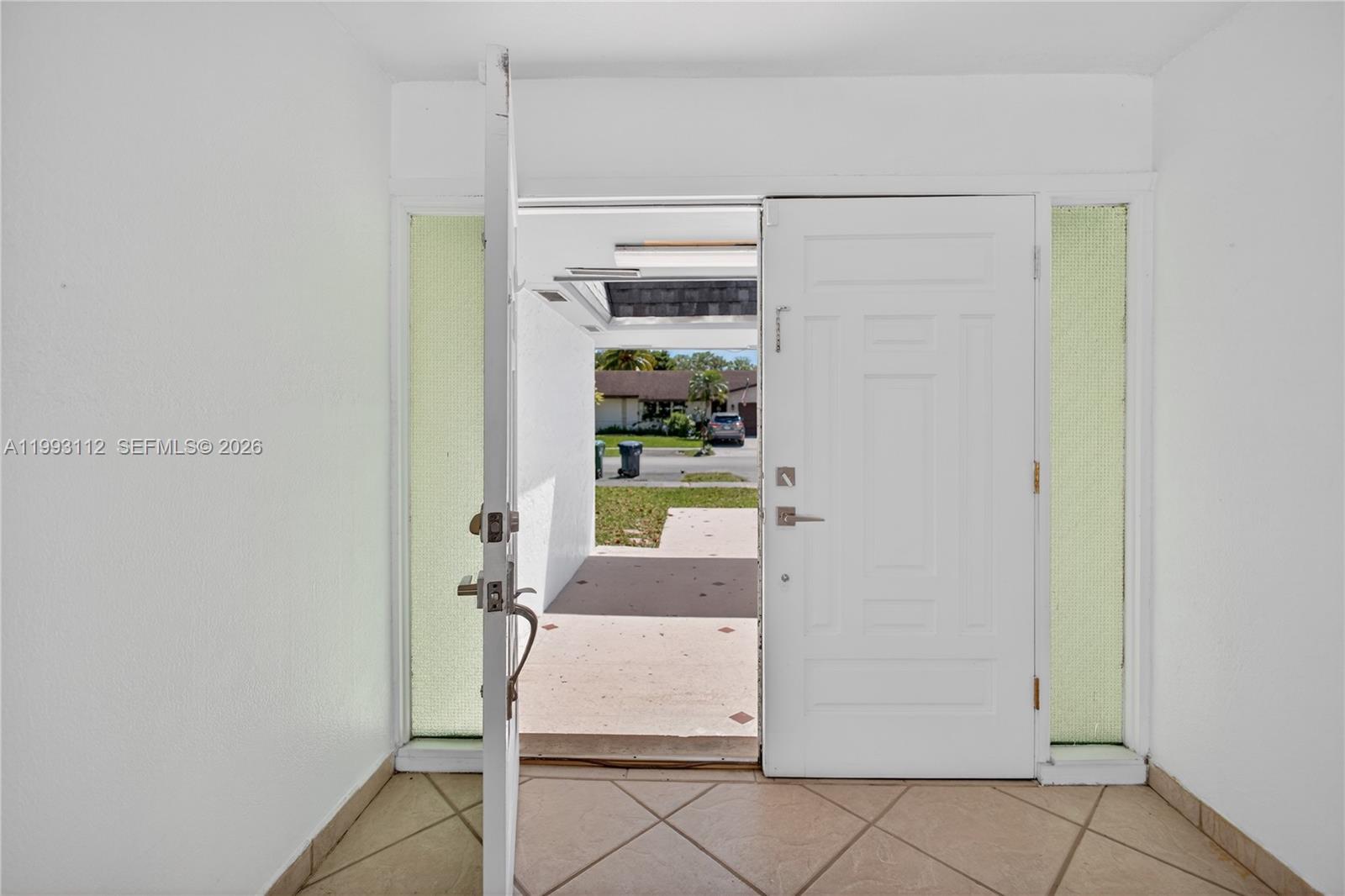 13471 Southwest 99th Terrace Miami, FL 33186 - Photo 15 of 44 a room with a walk in closet and a window