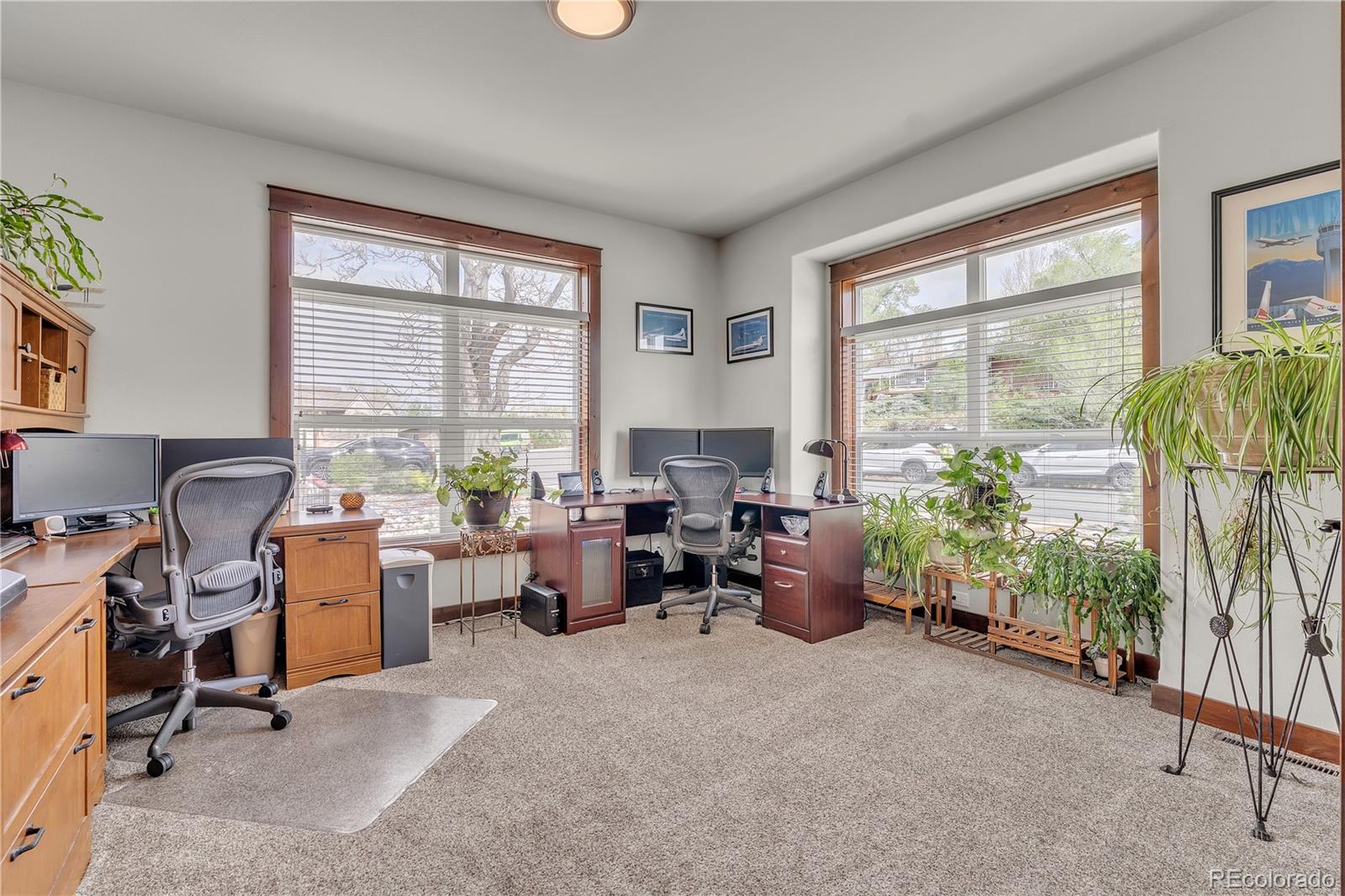 6839 Estes Drive Arvada, CO 80004 - Photo 11 of 34 a workspace with furniture and a window