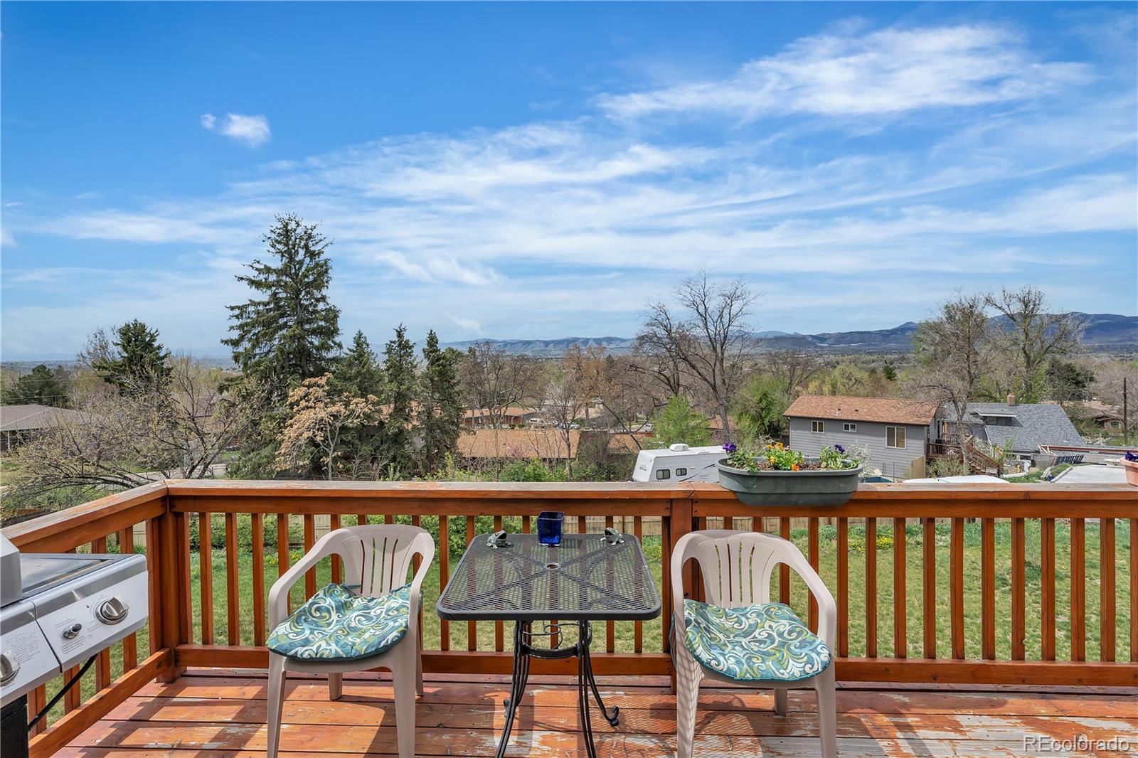 6839 Estes Drive Arvada, CO 80004 - Photo 26 of 34 a view of a city from a balcony