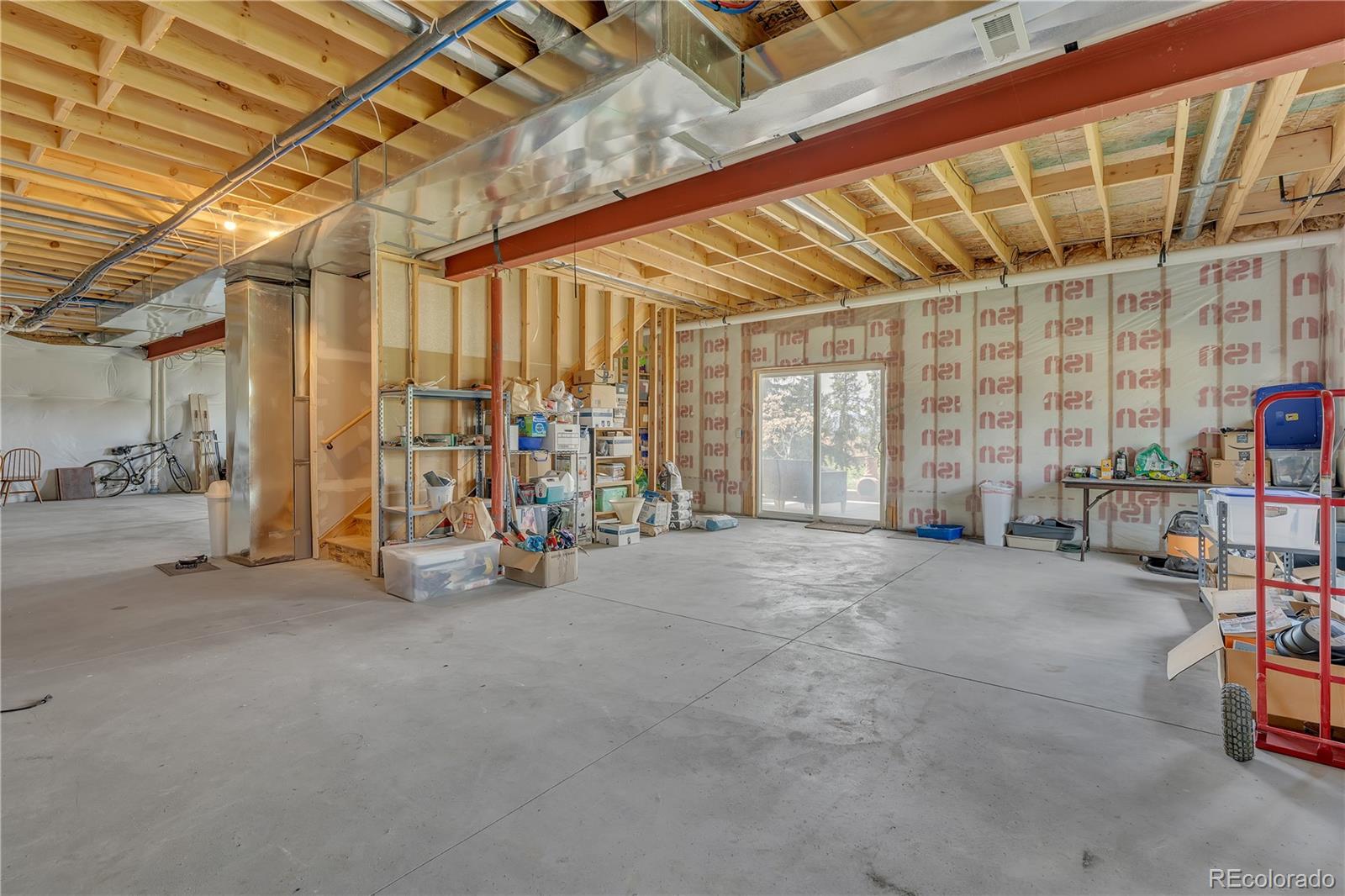 6839 Estes Drive Arvada, CO 80004 - Photo 27 of 34 a view of a room with gym equipment